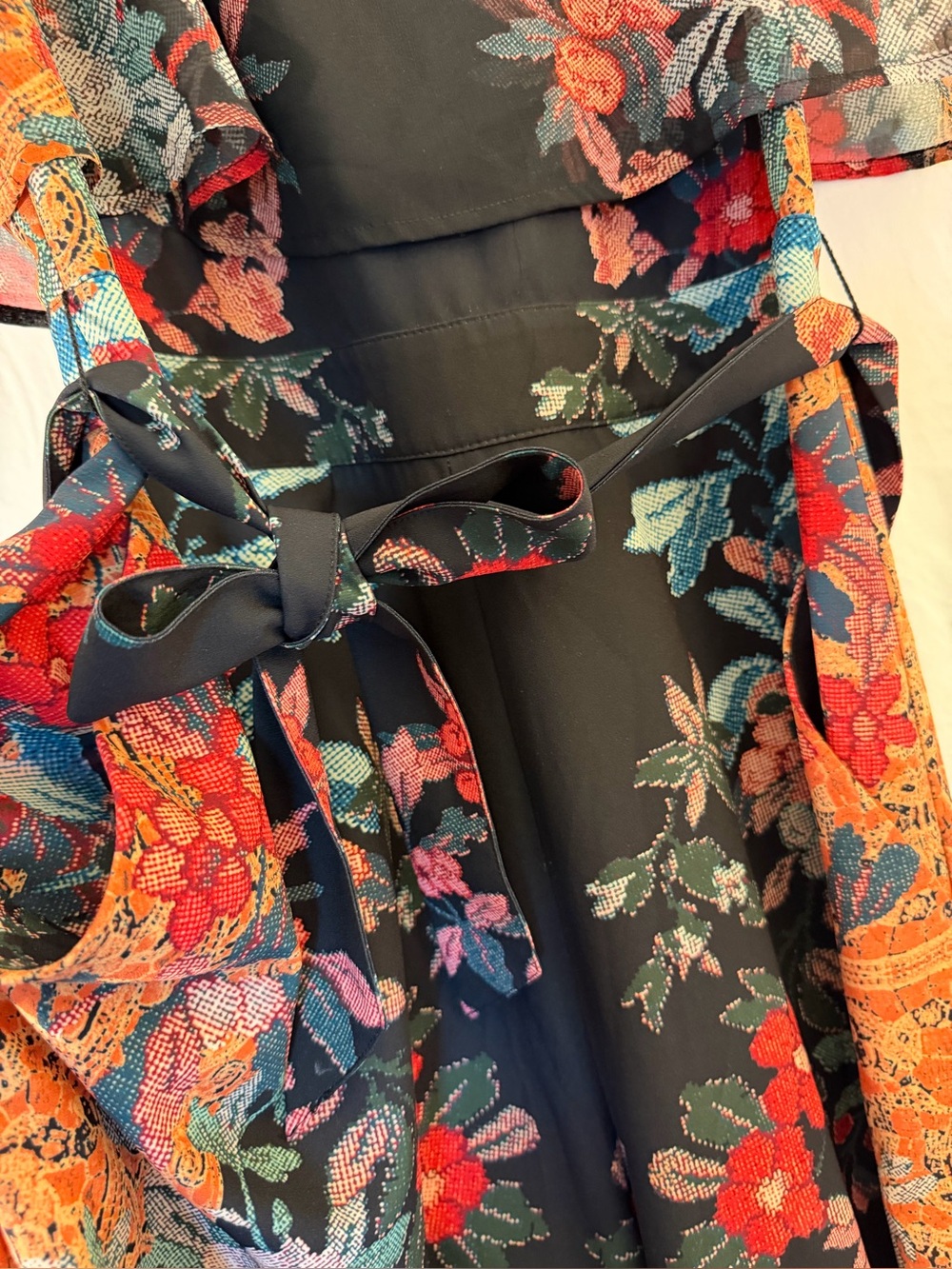 Bebe jumpsuit in size 6 black with antique floral peplum top waist tie so chic